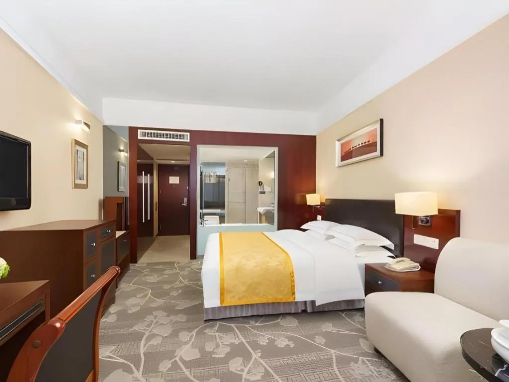 Bed in Shantou Golden Gulf Hotel