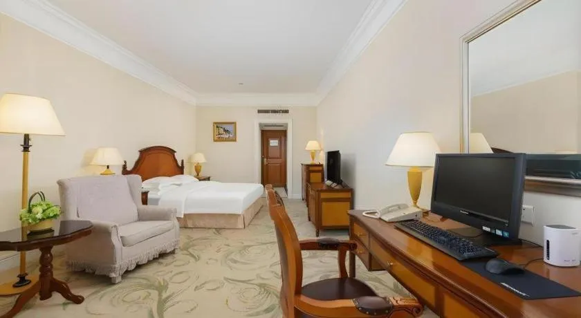 Bed in Shantou Golden Gulf Hotel