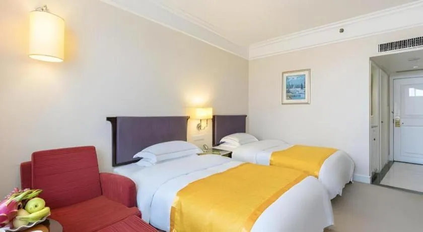 Bed in Shantou Golden Gulf Hotel