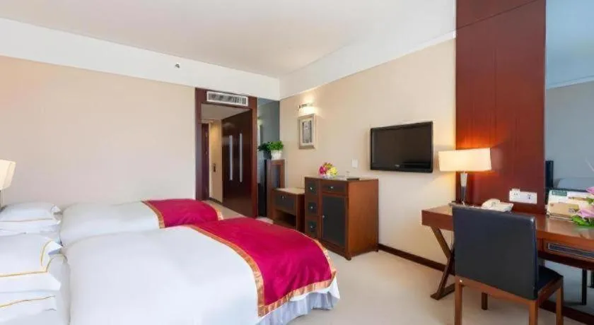 Bed in Shantou Golden Gulf Hotel