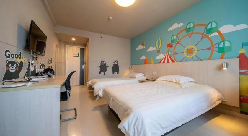 Bed in Jinjiang Inn Zhenjiang Jiangsu University Suning Plaza