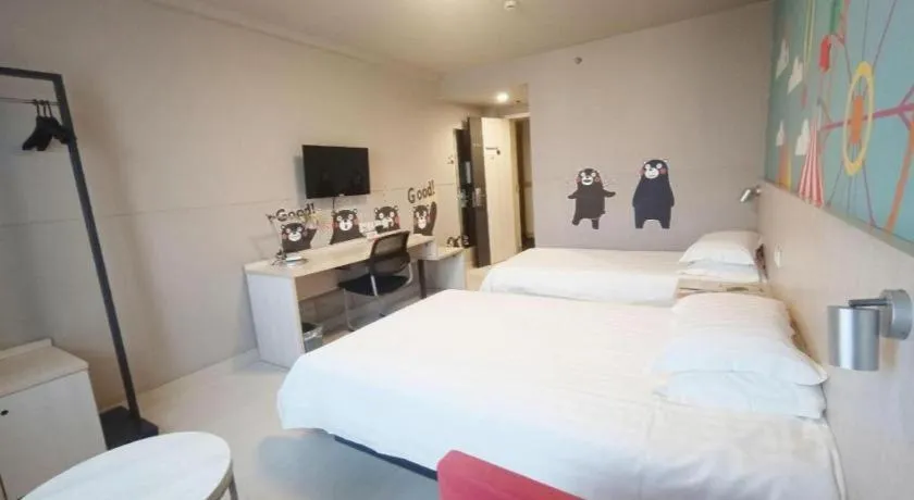 Bed in Jinjiang Inn Zhenjiang Jiangsu University Suning Plaza