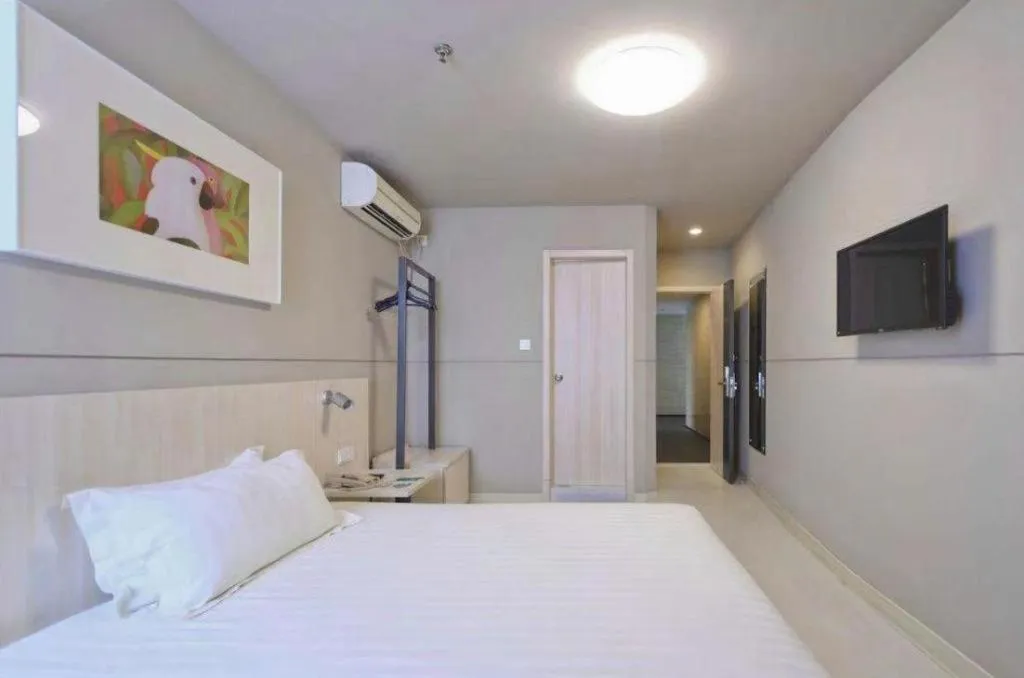Bed in Jinjiang Inn Zhenjiang Jiangsu University Suning Plaza