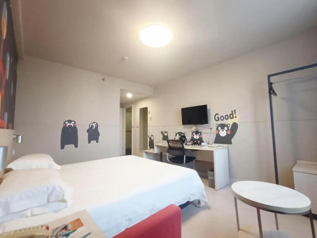 Bed in Jinjiang Inn Zhenjiang Jiangsu University Suning Plaza