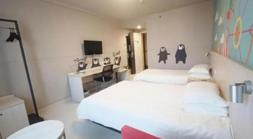 Bed in Jinjiang Inn Zhenjiang Jiangsu University Suning Plaza