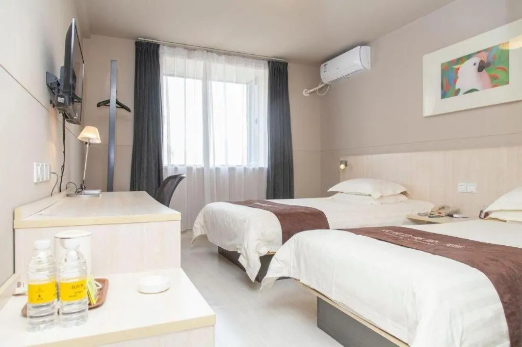 Bed in Jinjiang Inn Zhenjiang Jiangsu University Suning Plaza