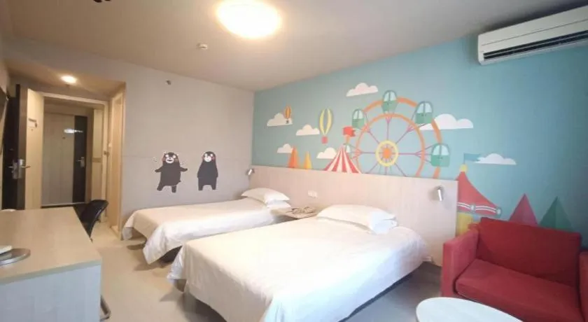 Bed in Jinjiang Inn Zhenjiang Jiangsu University Suning Plaza