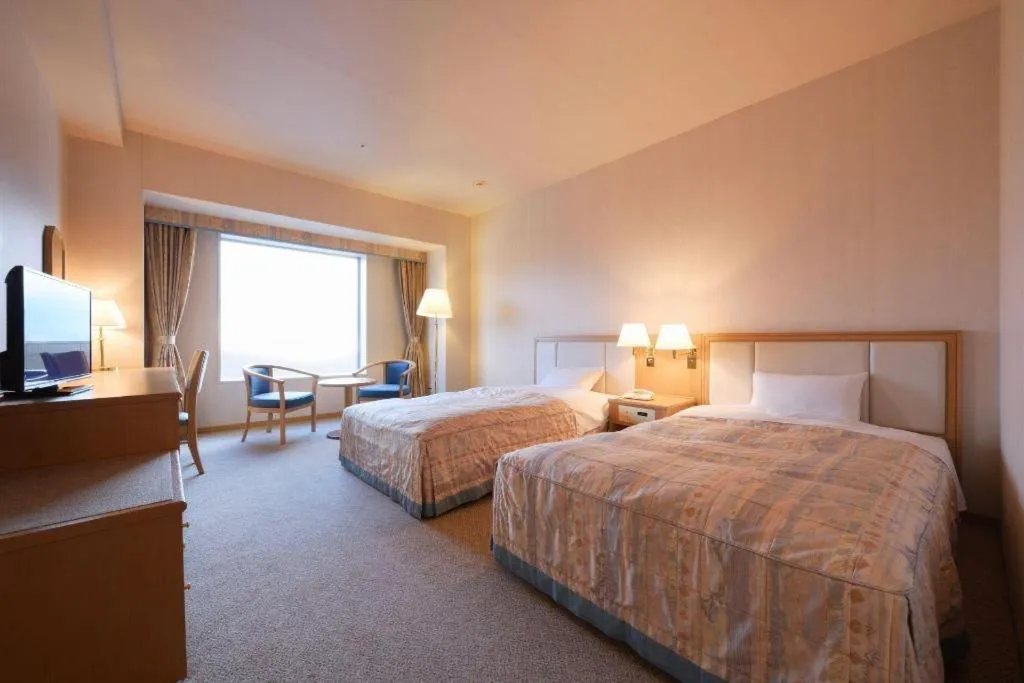 Bed in Grand Hotel New Oji