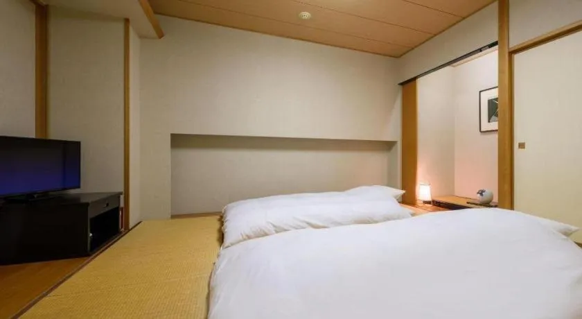 Bed in Grand Hotel New Oji