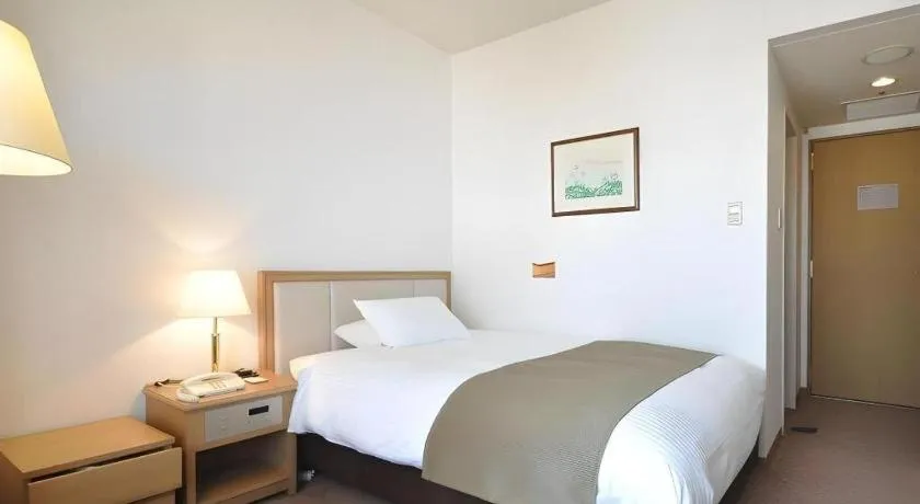 Bed in Grand Hotel New Oji