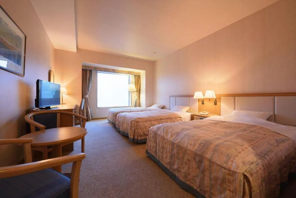 Bed in Grand Hotel New Oji