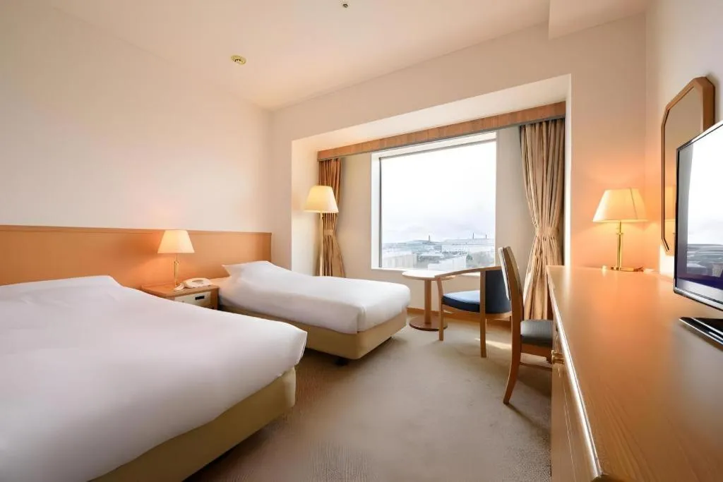 Bed in Grand Hotel New Oji