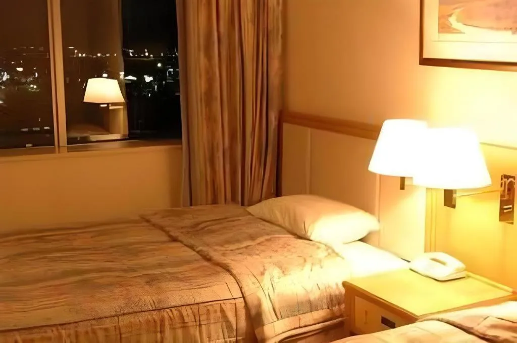 Bed in Grand Hotel New Oji