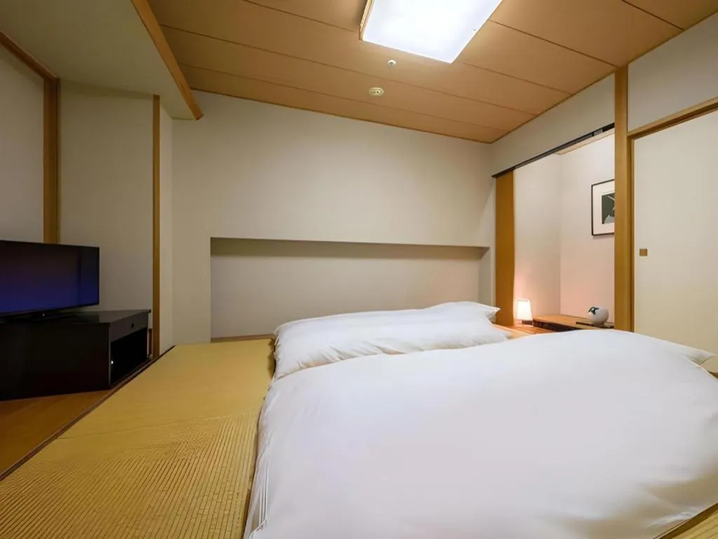 Bed in Grand Hotel New Oji