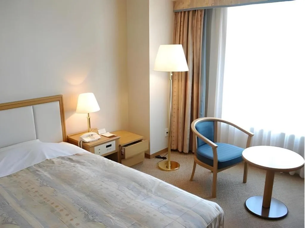 Bed in Grand Hotel New Oji