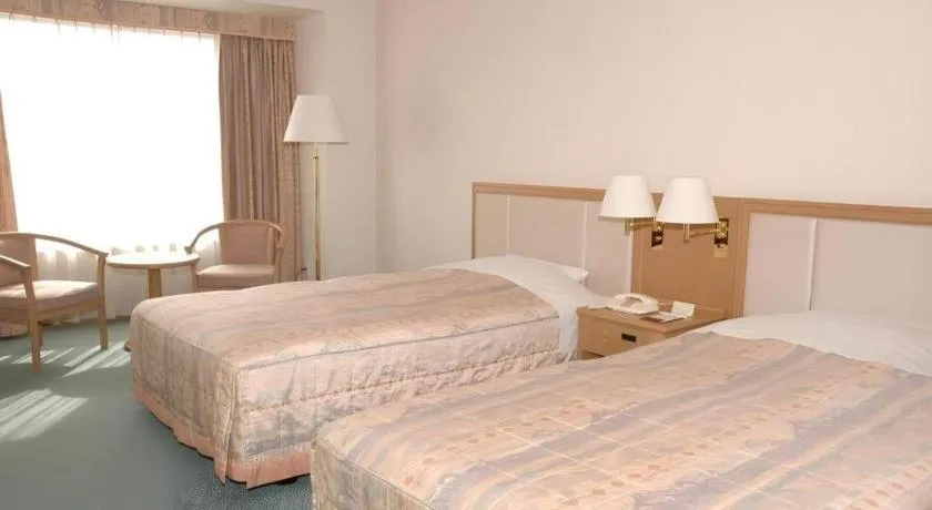 Bed in Grand Hotel New Oji