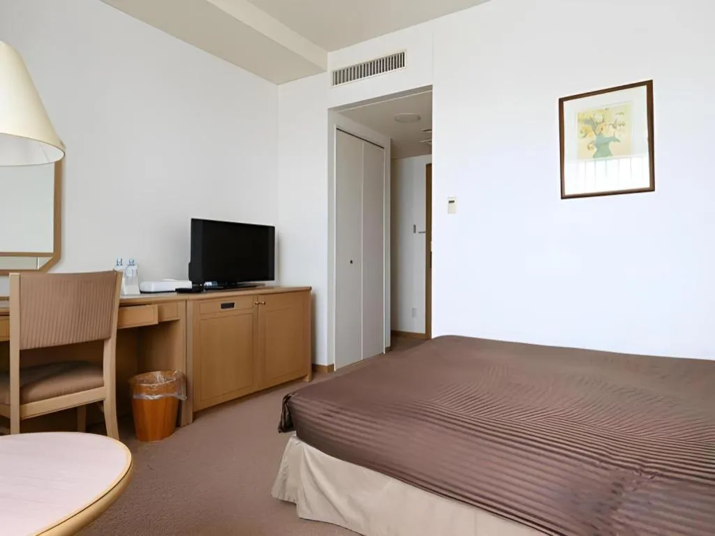 Bed in Grand Hotel New Oji