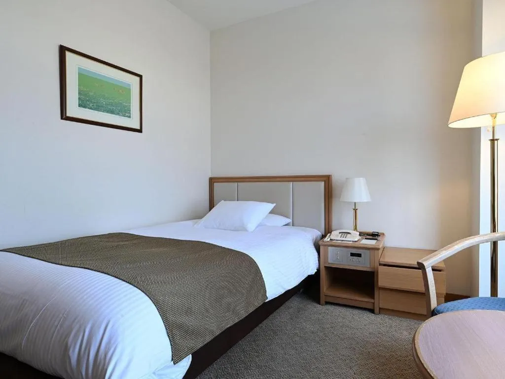Bed in Grand Hotel New Oji
