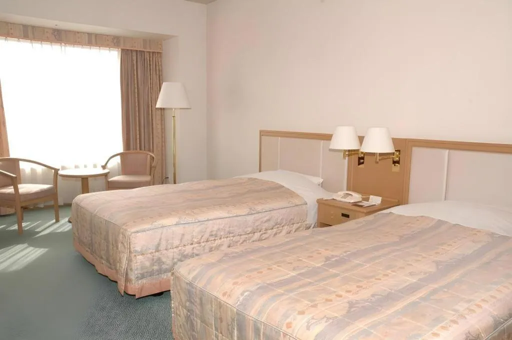 Bed in Grand Hotel New Oji