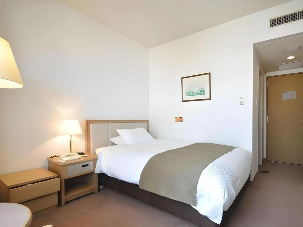 Bed in Grand Hotel New Oji