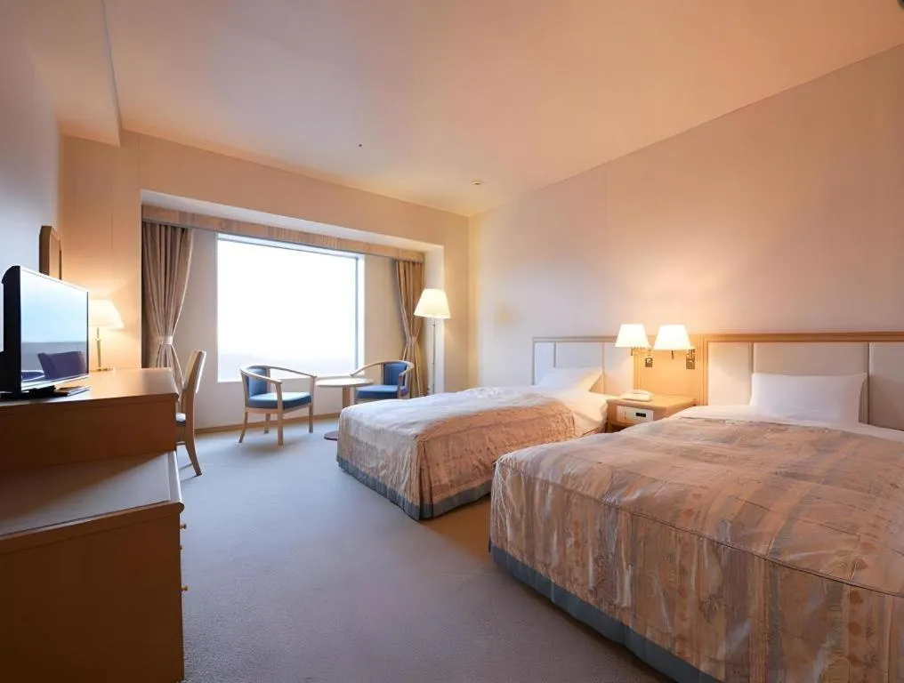 Bed in Grand Hotel New Oji