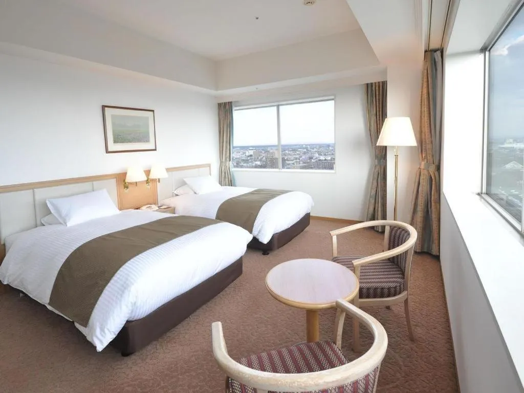 Bed in Grand Hotel New Oji