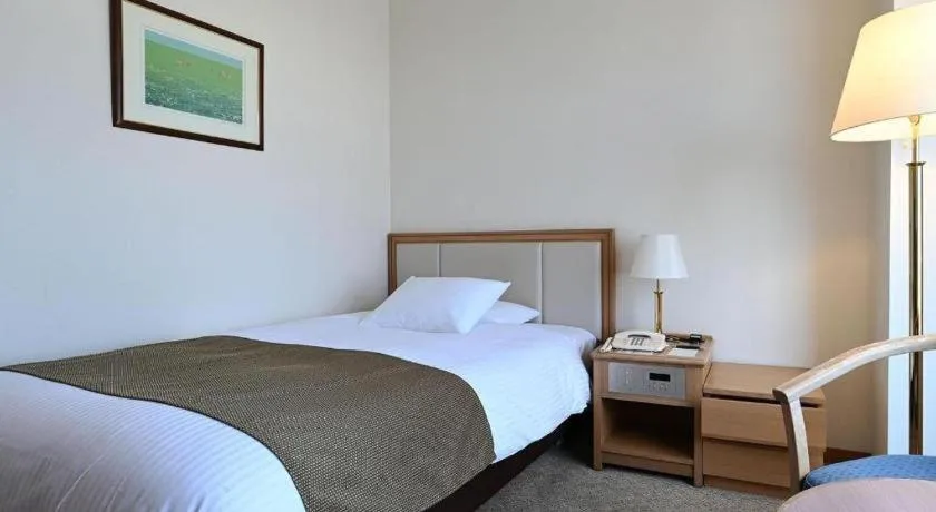Bed in Grand Hotel New Oji
