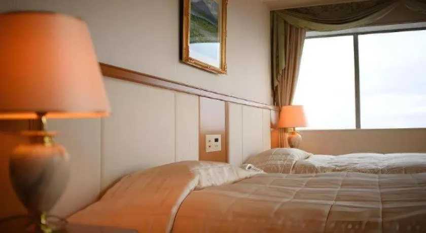 Bed in Grand Hotel New Oji