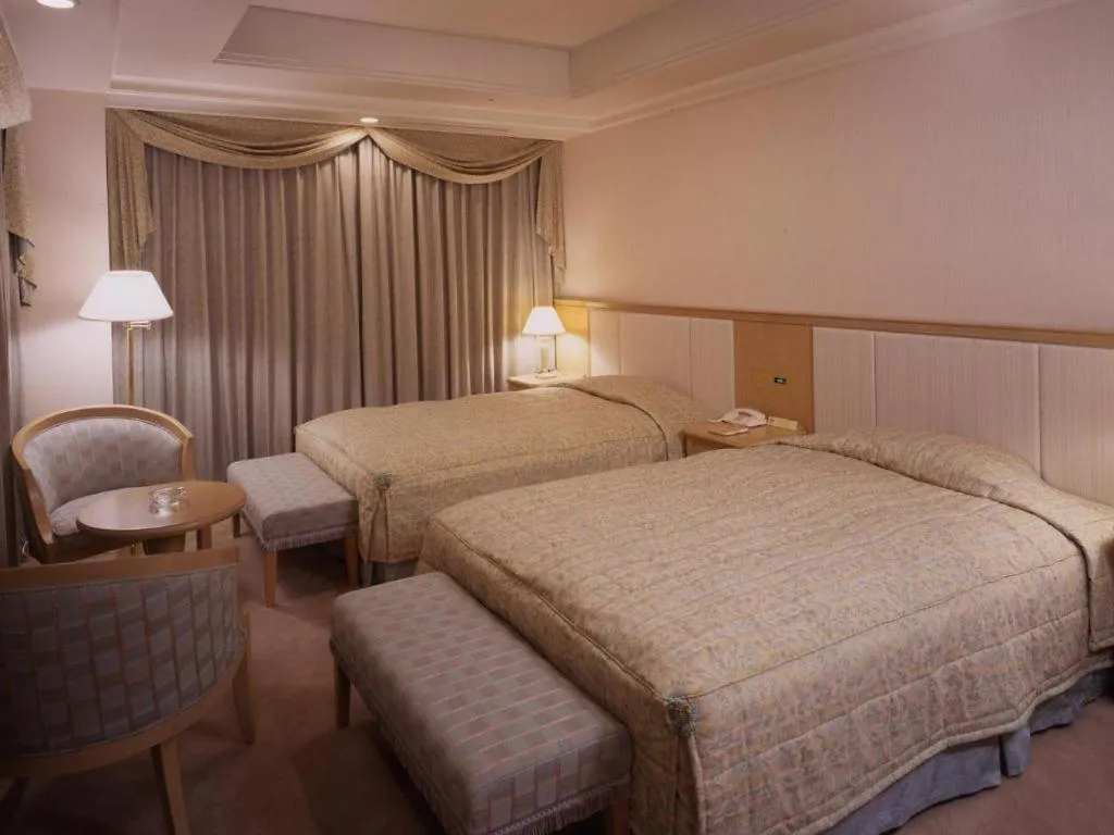 Bed in Grand Hotel New Oji
