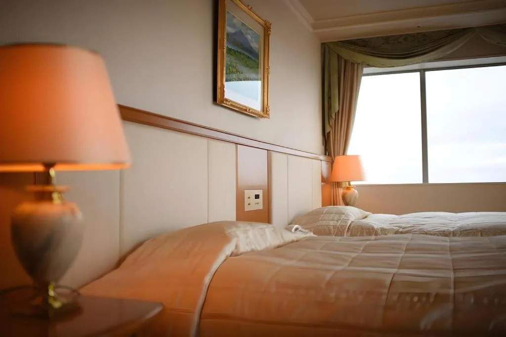 Bed in Grand Hotel New Oji