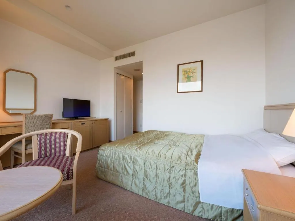Bed in Grand Hotel New Oji