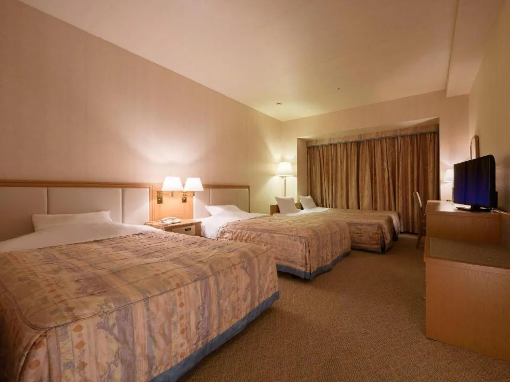 Bed in Grand Hotel New Oji