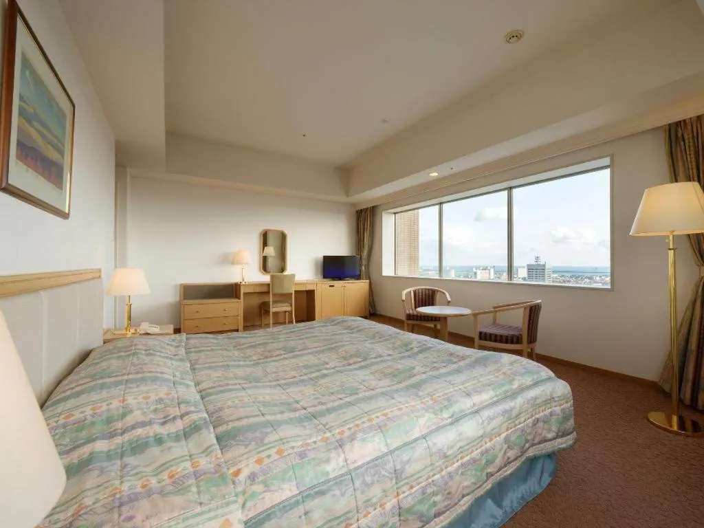 Bed in Grand Hotel New Oji