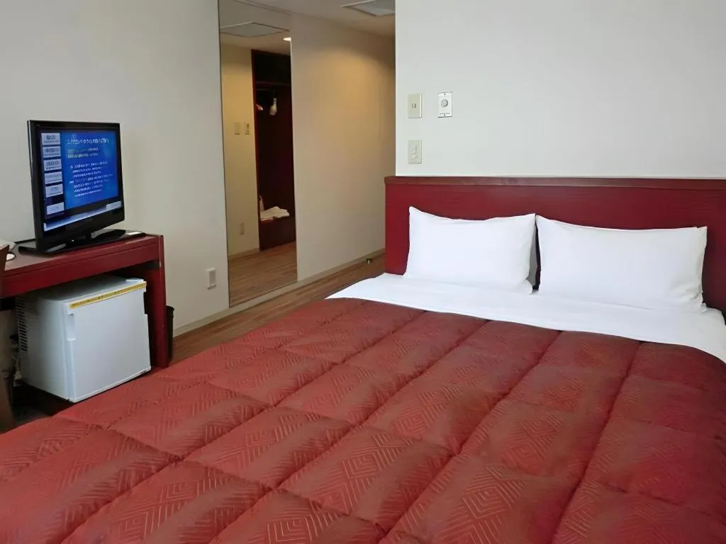 Bed in Spa Land Hotel Naito