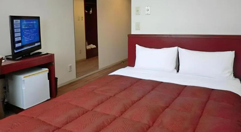 Bed in Spa Land Hotel Naito