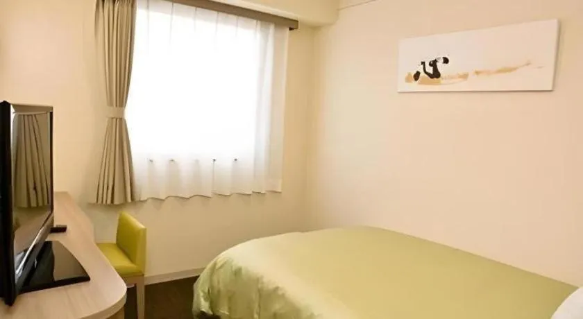 Bed in Spa Land Hotel Naito