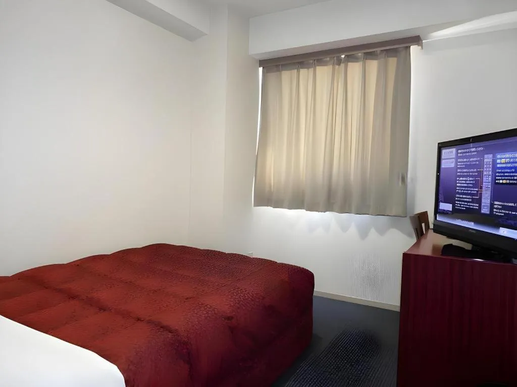 Bed in Spa Land Hotel Naito