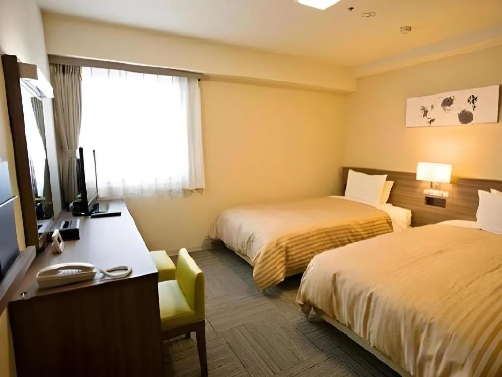 Bed in Spa Land Hotel Naito