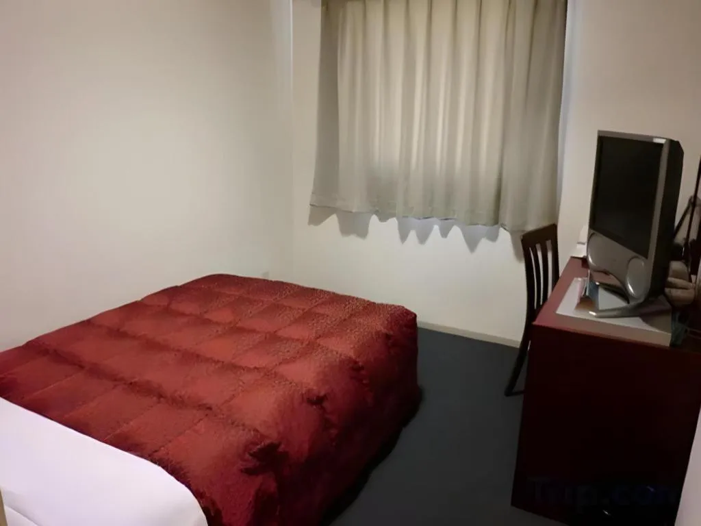 Bed in Spa Land Hotel Naito