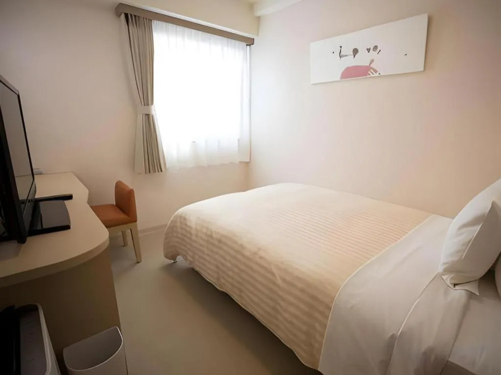 Bed in Spa Land Hotel Naito