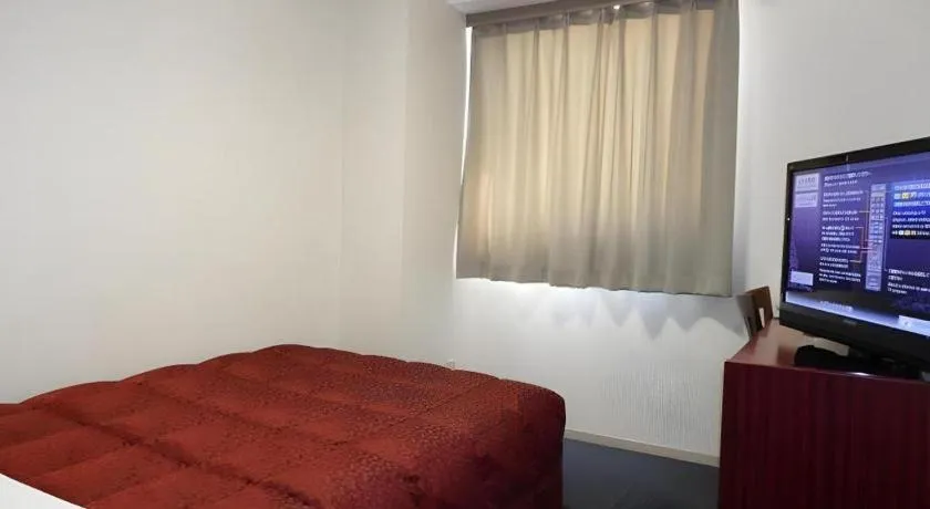 Bed in Spa Land Hotel Naito