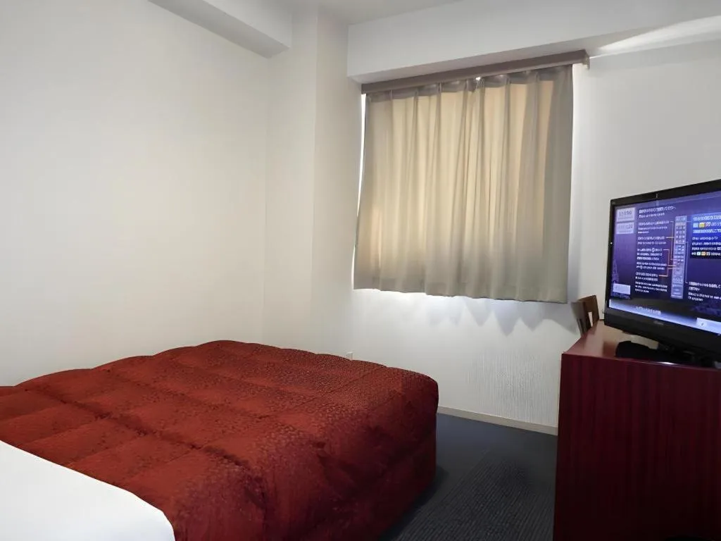 Bed in Spa Land Hotel Naito