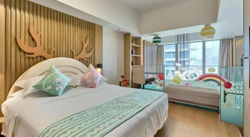 Bed in Huafa Executive Apartment Hotel Zhuhai
