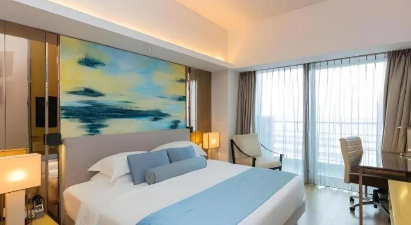 Bed in Huafa Executive Apartment Hotel Zhuhai