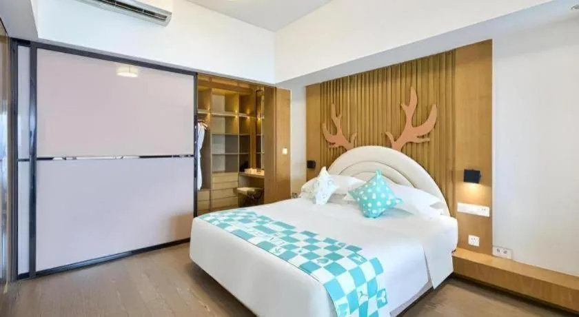 Bed in Huafa Executive Apartment Hotel Zhuhai