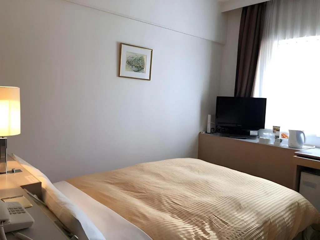 Bed in Hotel Castle Plaza