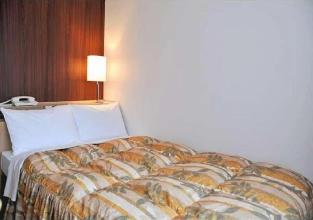 Bed in Hotel Castle Plaza