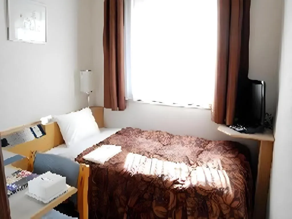 Bed in Hotel Castle Plaza