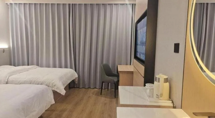 Bed in GreenTree Inn Shanghai Songjiang WanDa Plaza RonGMEi Road Express Hotel