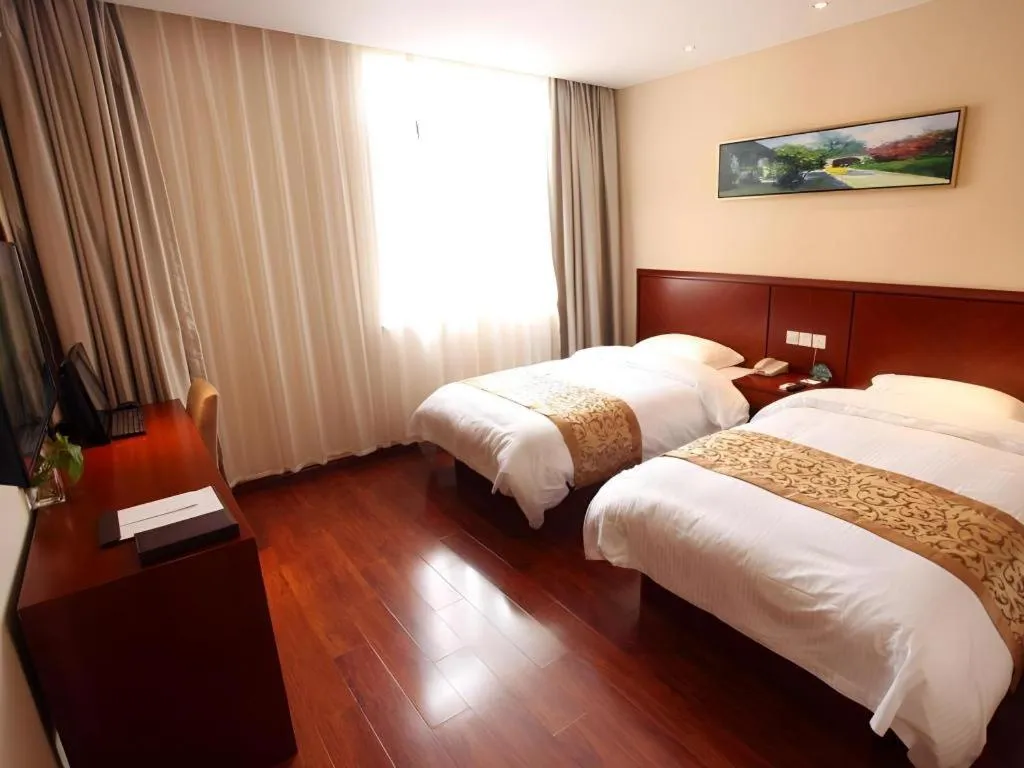 Bed in GreenTree Inn Shanghai Songjiang WanDa Plaza RonGMEi Road Express Hotel